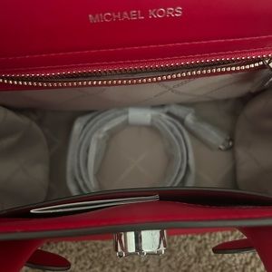 Red Michael Kors handbag